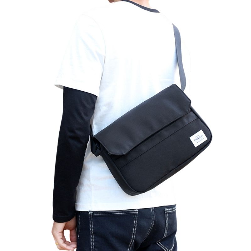 Small-Black-Nylon-Messenger-Bag-wear-by-model